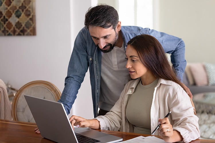 Couple reviewing insurance options together